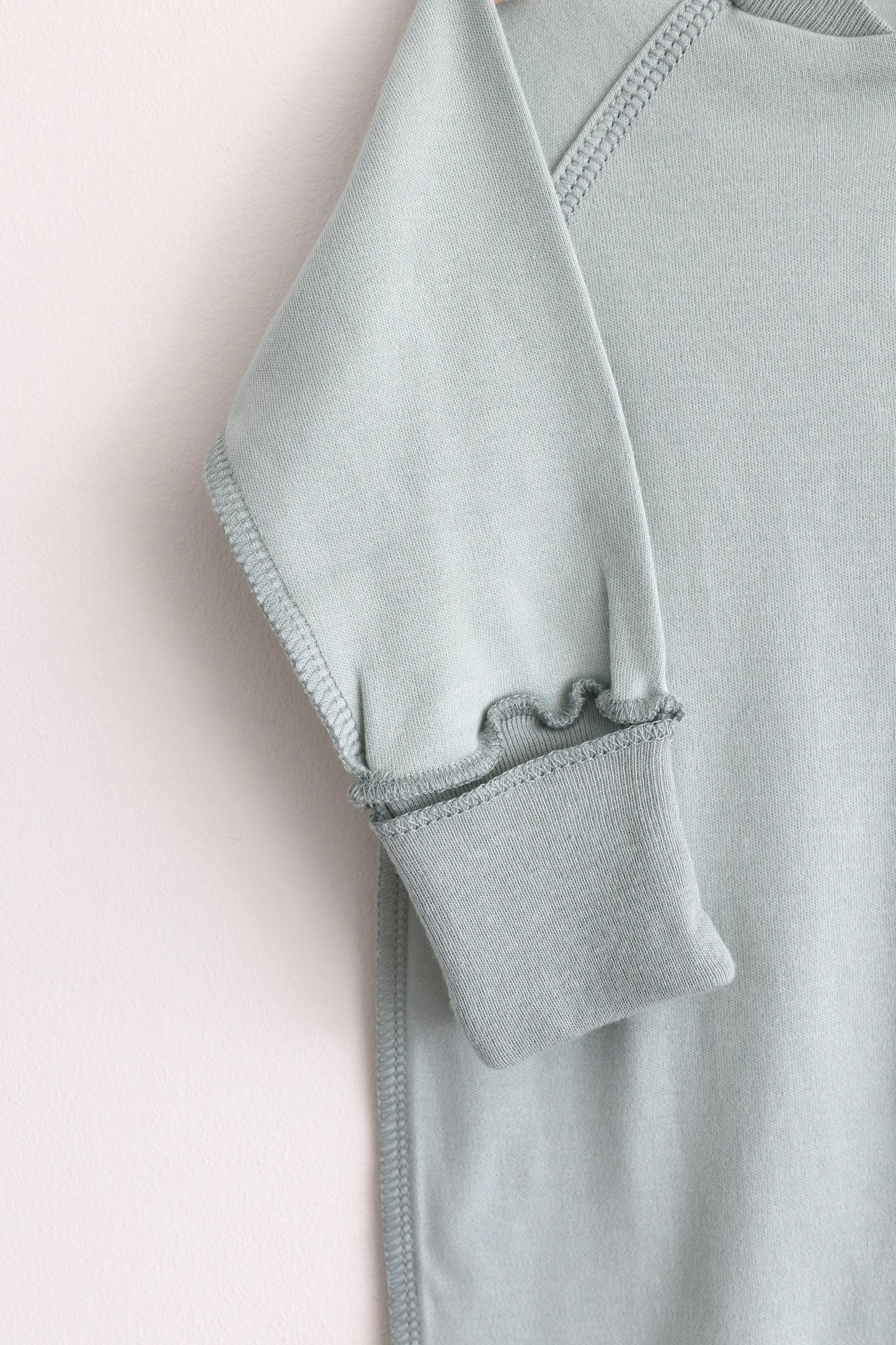Gift shopping for infant essentials or creating a baby registry, you have found the best neutral tone unisex sleepsuit onesie, that is especially perfect for sensitive skin and newborn skin rash.