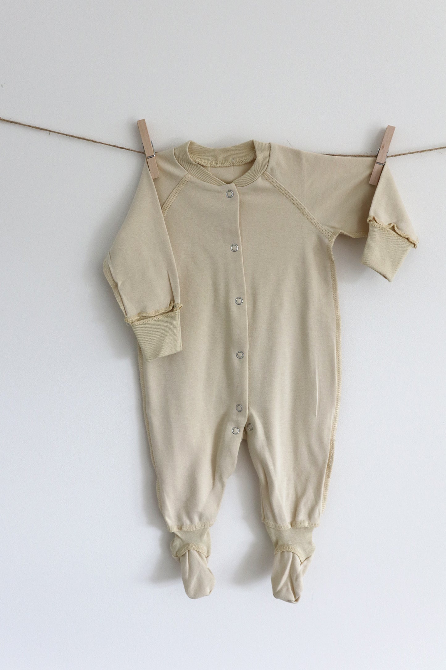 Gift shopping for infant essentials, you have found the best neutral tone unisex sleepsuit onesie, that is especially perfect for sensitive skin and newborn skin rash.
