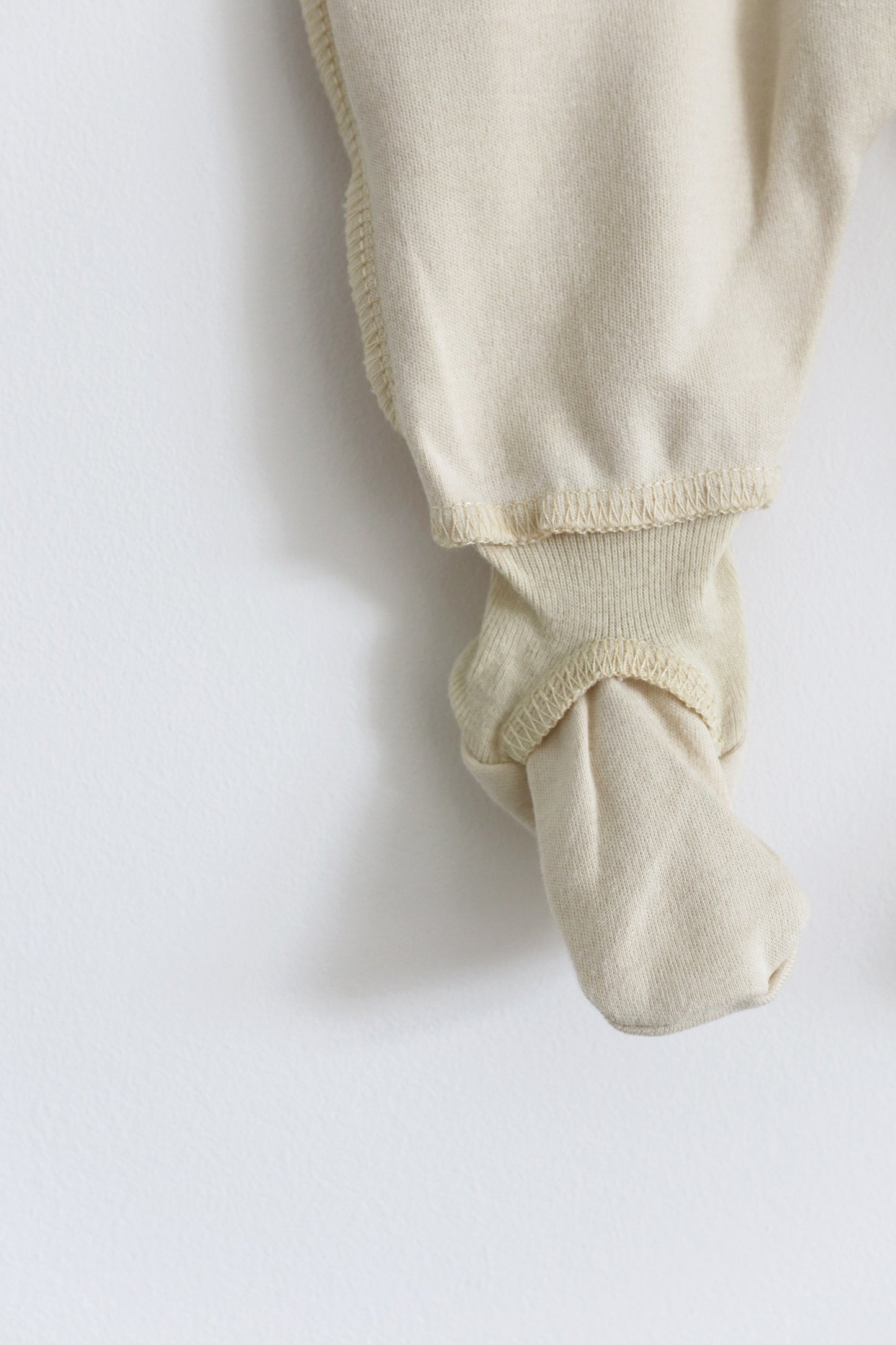 Gift shopping for infant essentials, you have found the best neutral tone unisex sleepsuit onesie, that is especially perfect for sensitive skin and newborn skin rash.