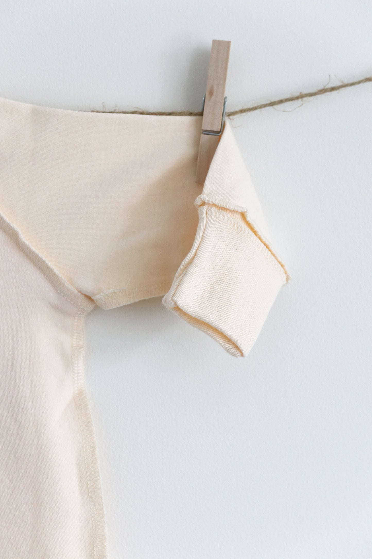 Gift shopping for infant essentials, you have found the best neutral tone unisex sleepsuit onesie, that is especially perfect for sensitive skin and newborn skin rash.