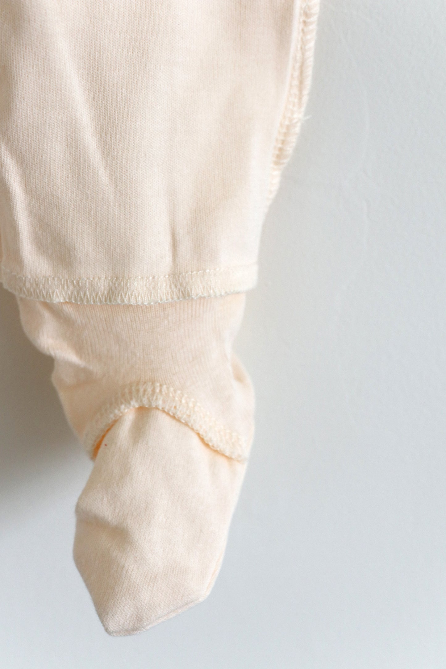 Gift shopping for infant essentials, you have found the best neutral tone unisex sleepsuit onesie, that is especially perfect for sensitive skin and newborn skin rash.