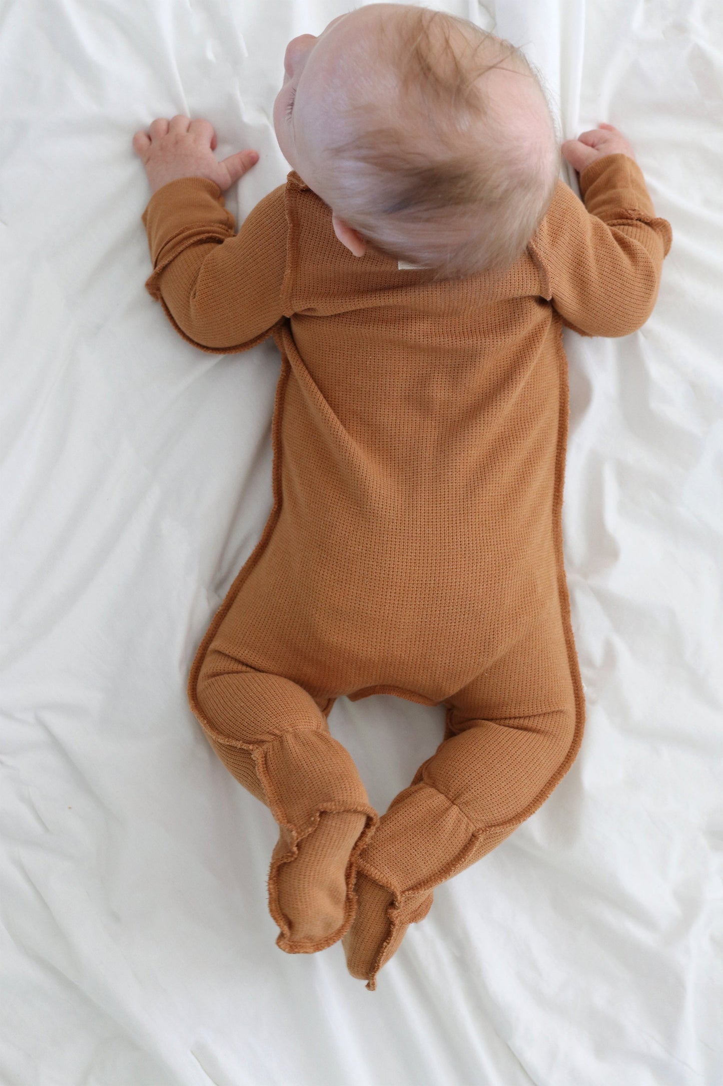 Gift shopping for infant essentials or creating a baby registry, you have found the best neutral tone unisex sleepsuit onesie, that is especially perfect for sensitive skin and newborn skin rash.