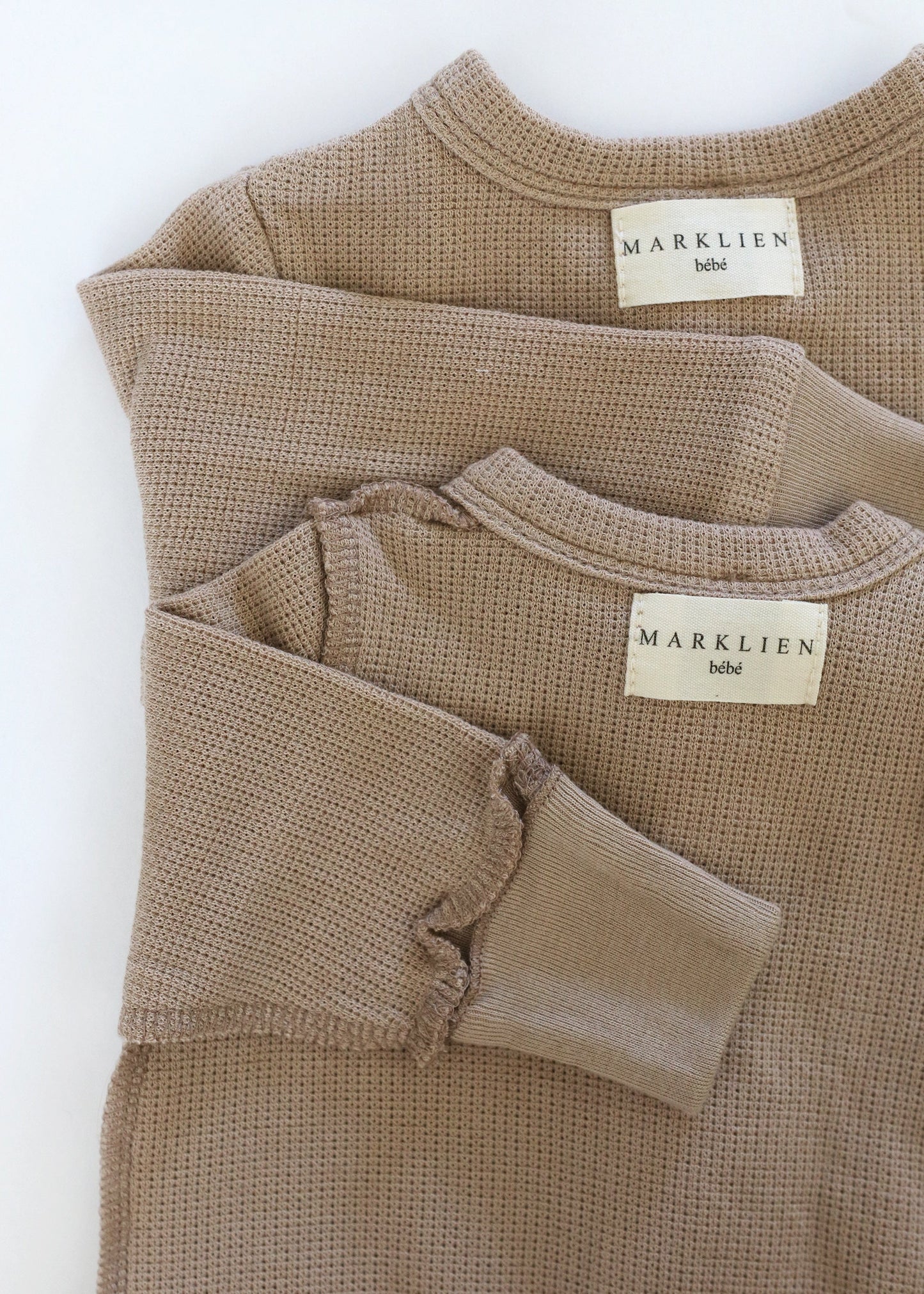 Gift shopping for infant essentials or creating a baby registry, you have found the best neutral tone unisex sleepsuit onesie, that is especially perfect for sensitive skin and newborn skin rash.