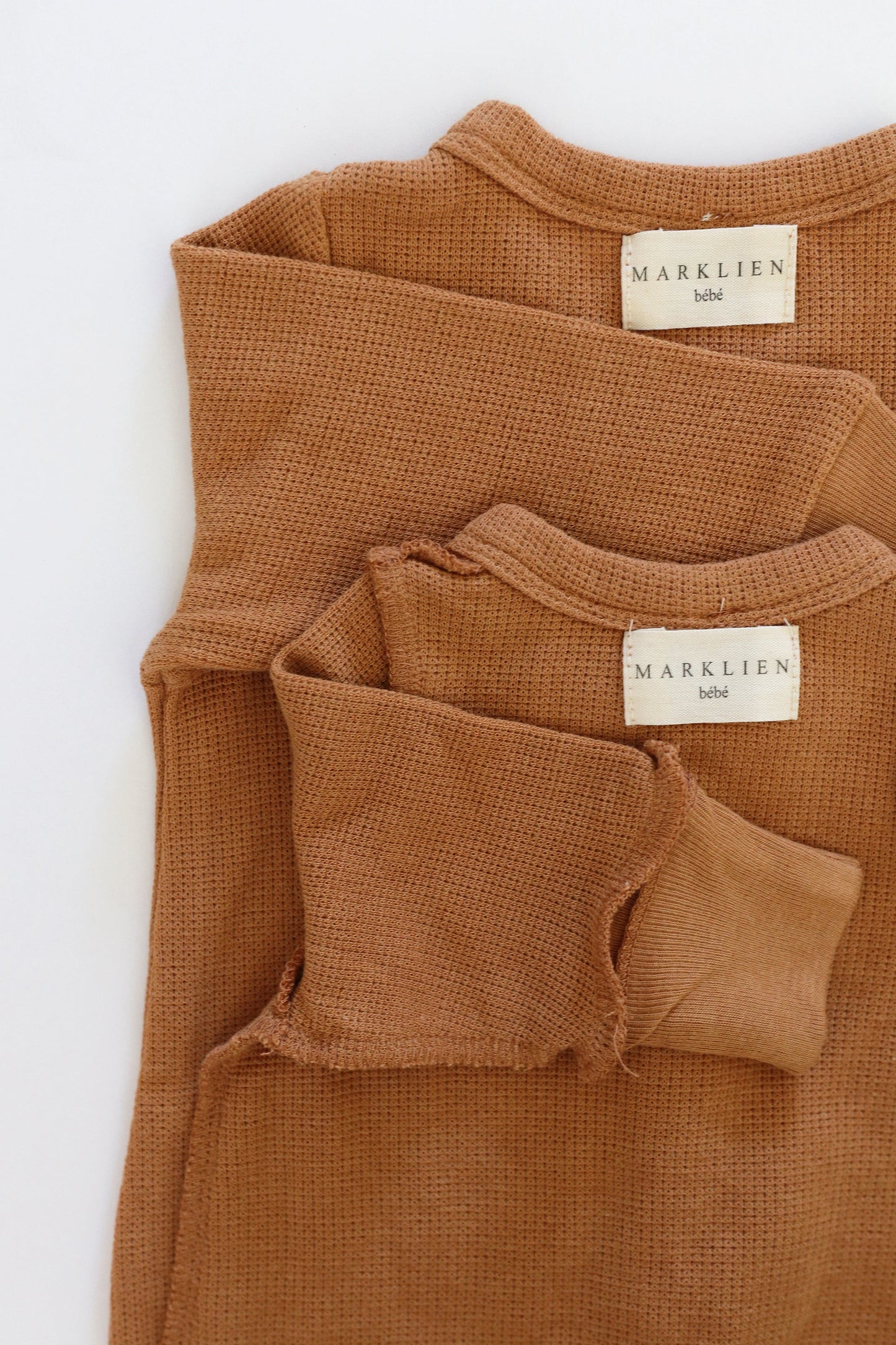 Gift shopping for infant essentials or creating a baby registry, you have found the best neutral tone unisex sleepsuit onesie, that is especially perfect for sensitive skin and newborn skin rash.