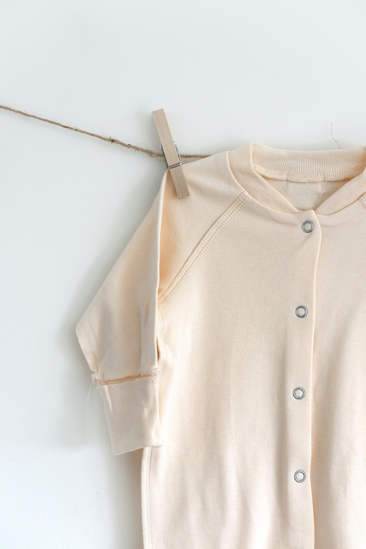 Gift shopping for infant essentials, you have found the best neutral tone unisex sleepsuit onesie, that is especially perfect for sensitive skin and newborn skin rash.