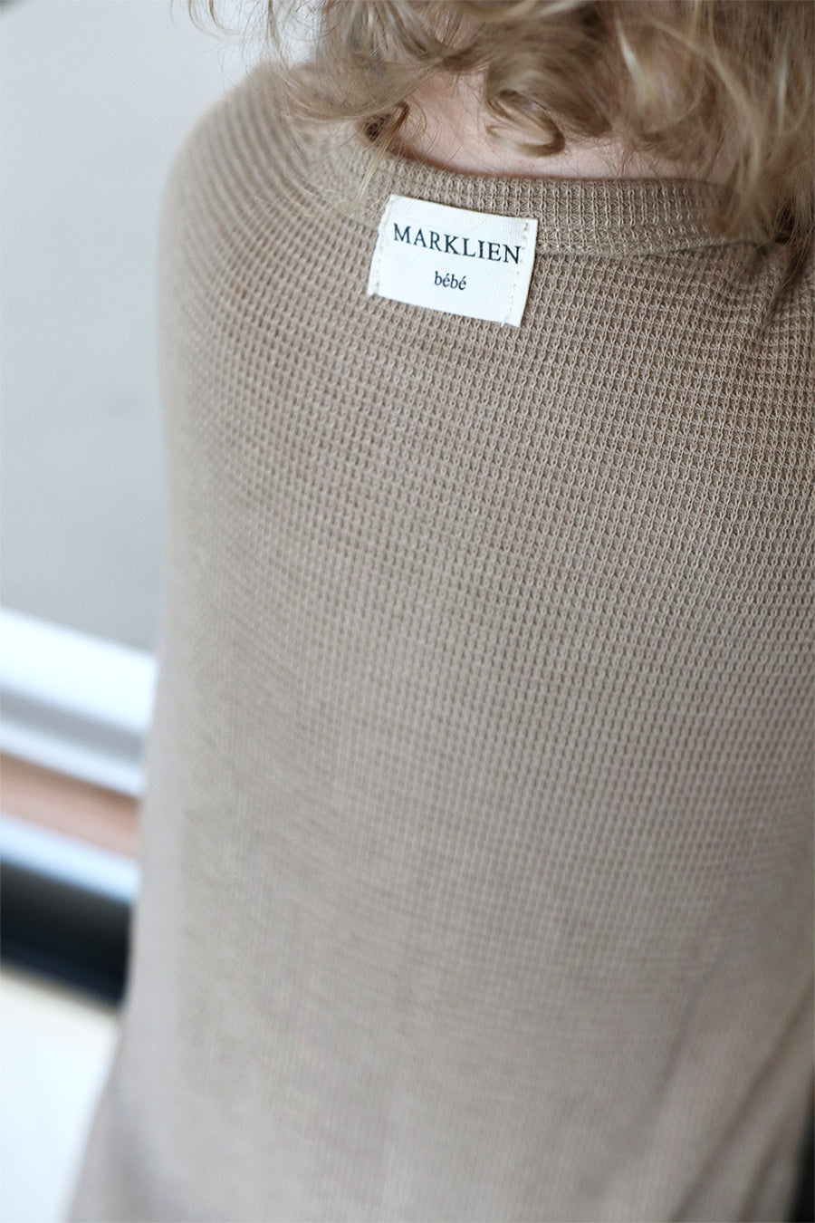Gift shopping for infant essentials or creating a baby registry, you have found the best neutral tone unisex 100% cotton waffle sleepsuit onesie.