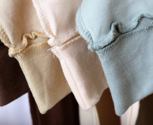 Outside seams Baby sleepsuits